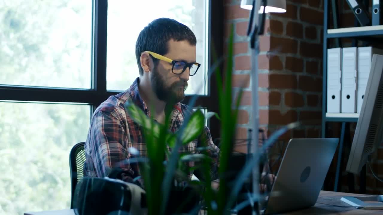 Stock Video Bearded Man Working At The Office Live Wallpaper For PC - Free Download
