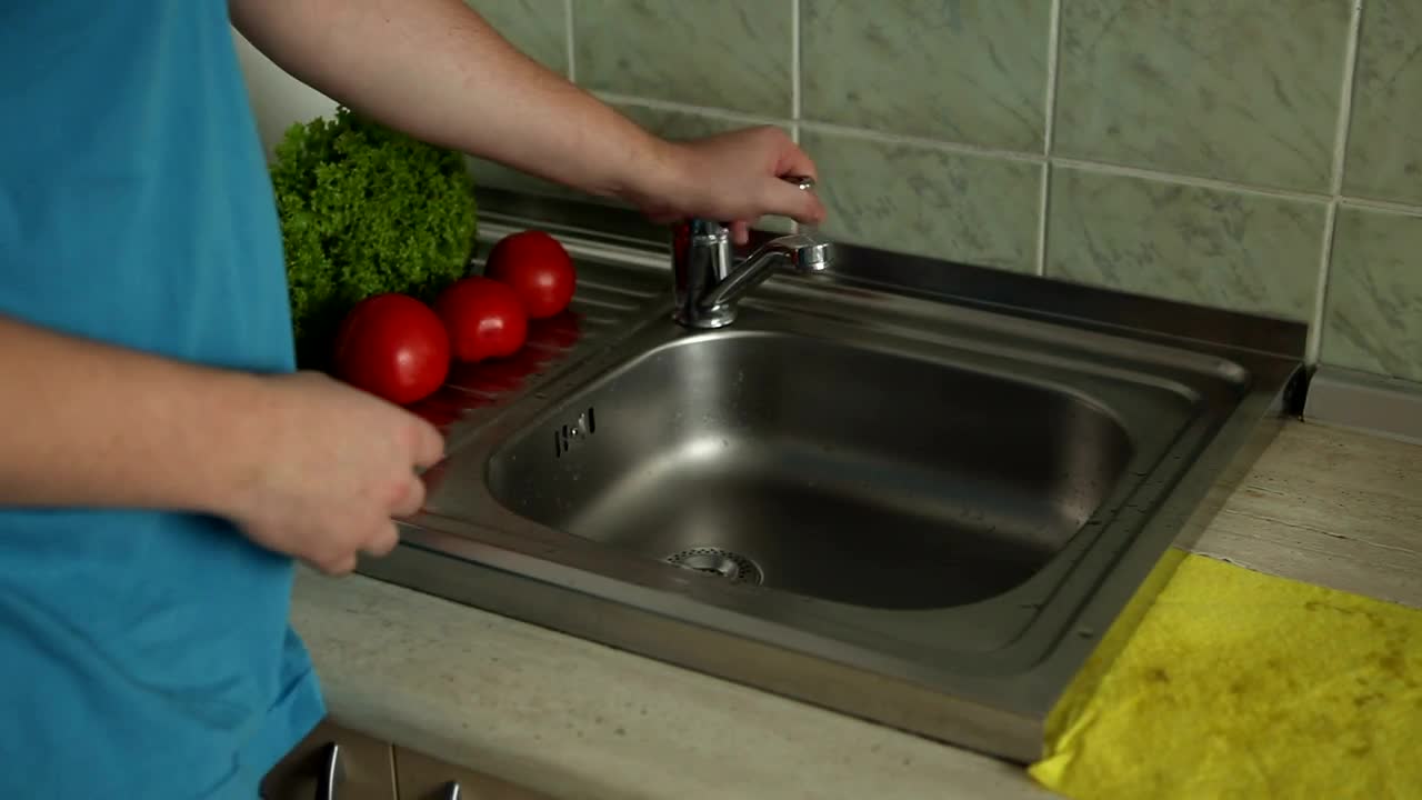 Stock Video Man On Diet Washing Vegetables In Sin Animated Wallpaper - Free Download