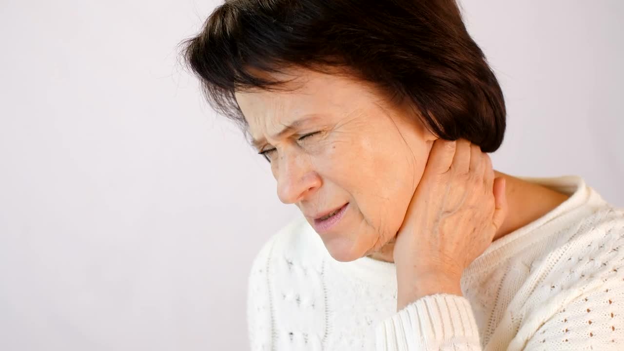 Stock Video Old Woman Sore Her Neck From Tension Live Wallpaper - Free Download