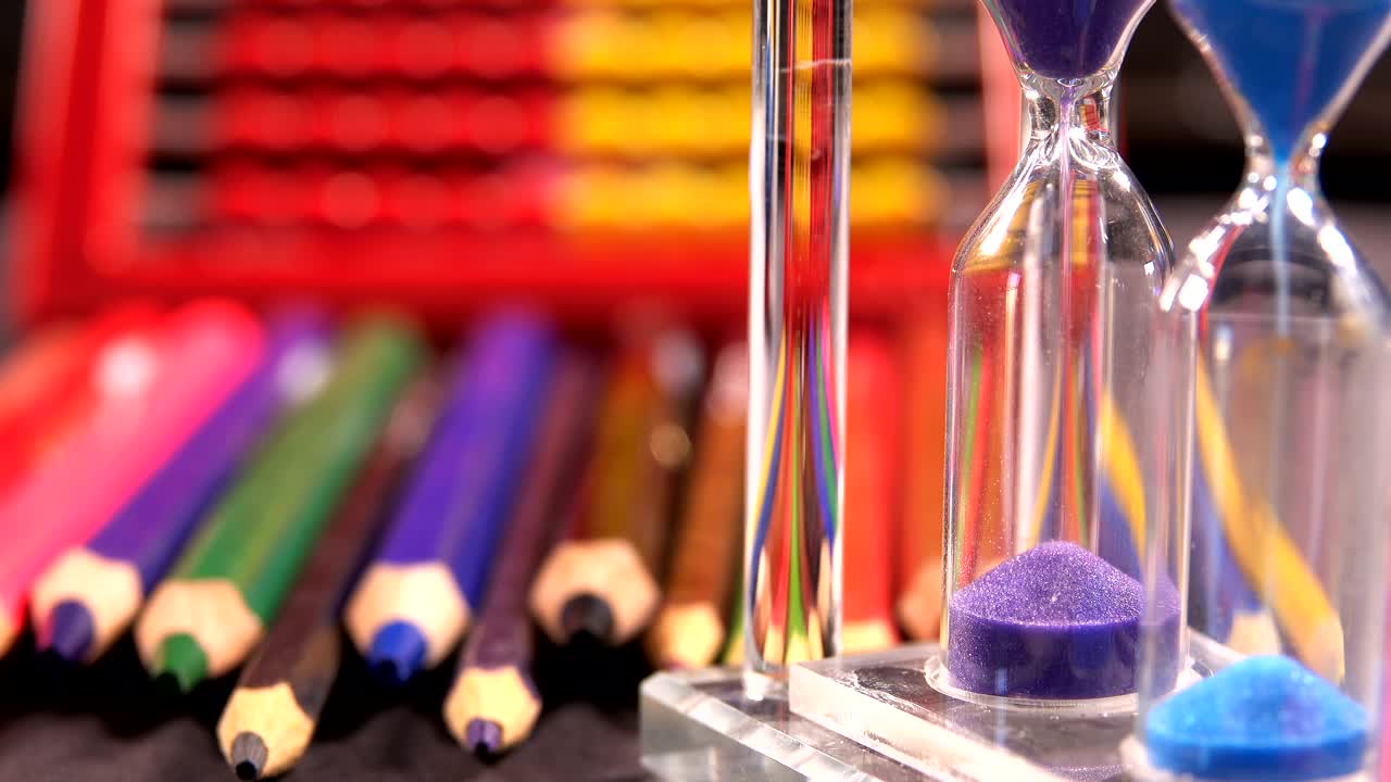 Stock Video Colored Hourglasses And School Supplies Live Wallpaper For PC - Free Download