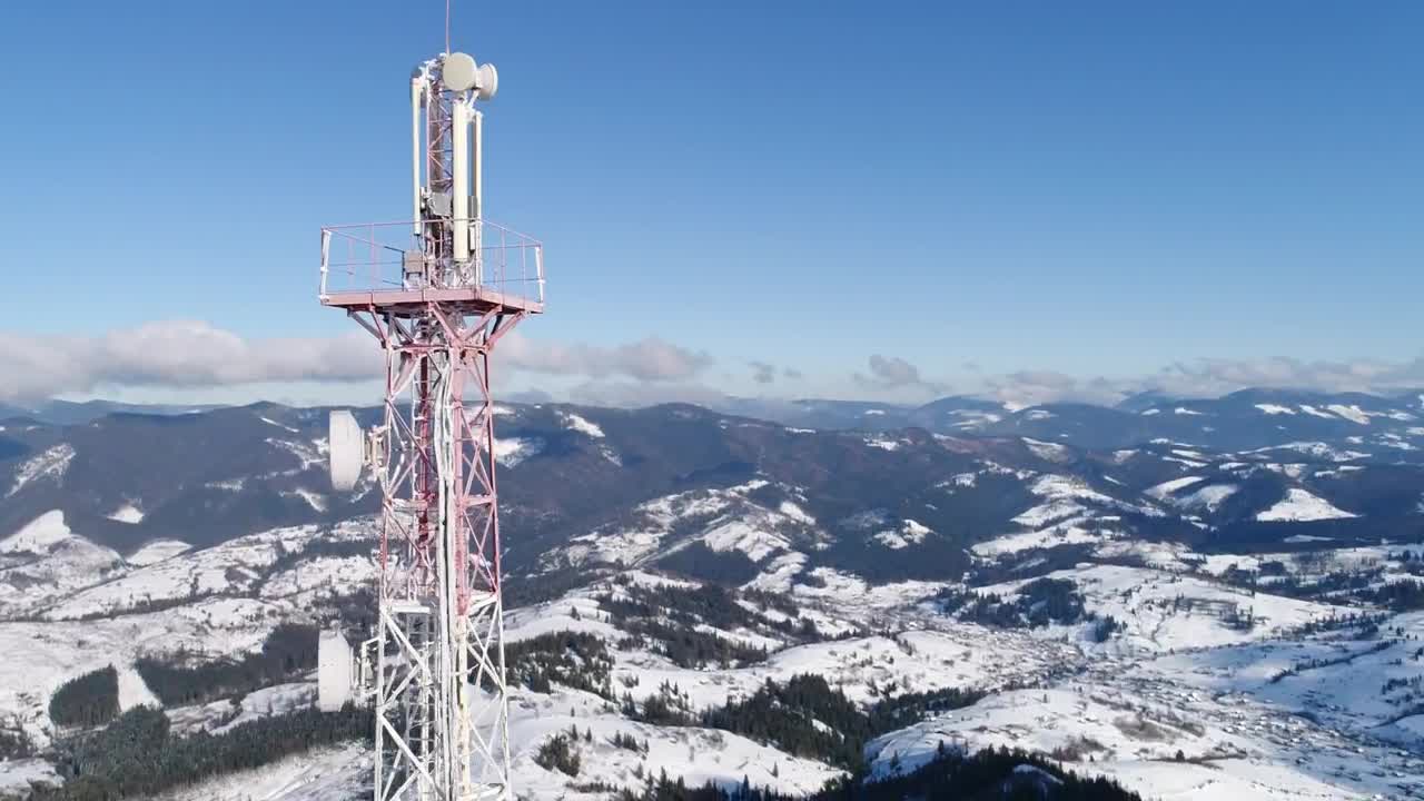 Stock Video Communications Tower In The Snowy Mountains Spinning Aerial Shot Live Wallpaper For PC - Free Download