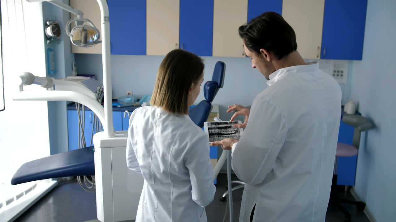 Stock Video Dental Staff Using A Tablet Computer Live Wallpaper For PC - Free Download