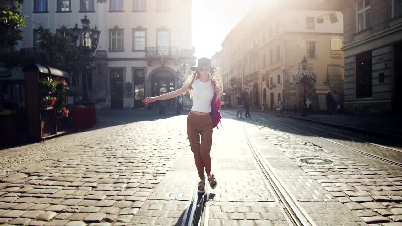 Stock Video Happy Woman Enjoying A Walk In The City Animated Wallpaper - Free Download