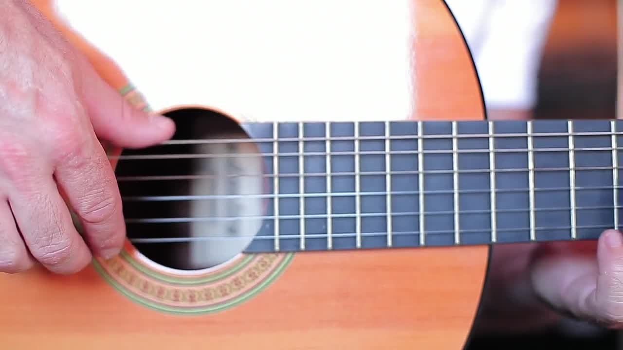 Stock Video Fingers Of A Man Playing The Strings Of A Guitar Live Wallpaper For PC - Free Download