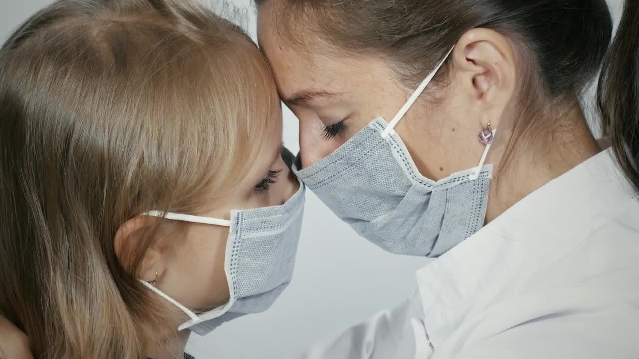 Stock Video Mother And Daughter Crying With Facemask Animated Wallpaper - Free Download