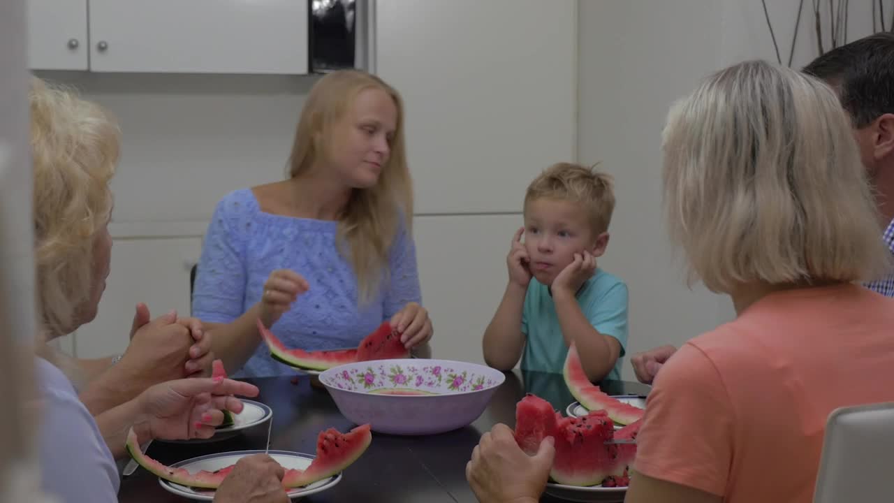 Stock Video Family Sharing A Watermelon Live Wallpaper For PC - Free Download