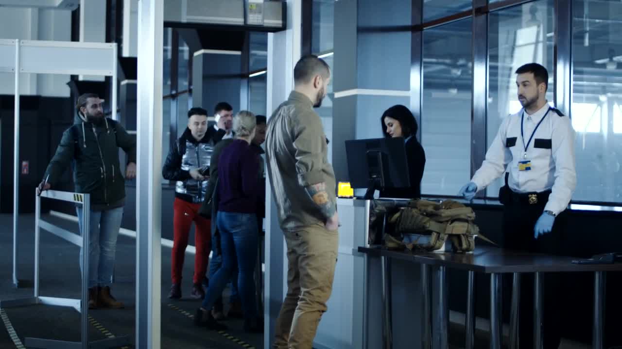 Stock Video Military Men Detain A Passenger At Airpor Animated Wallpaper - Free Download