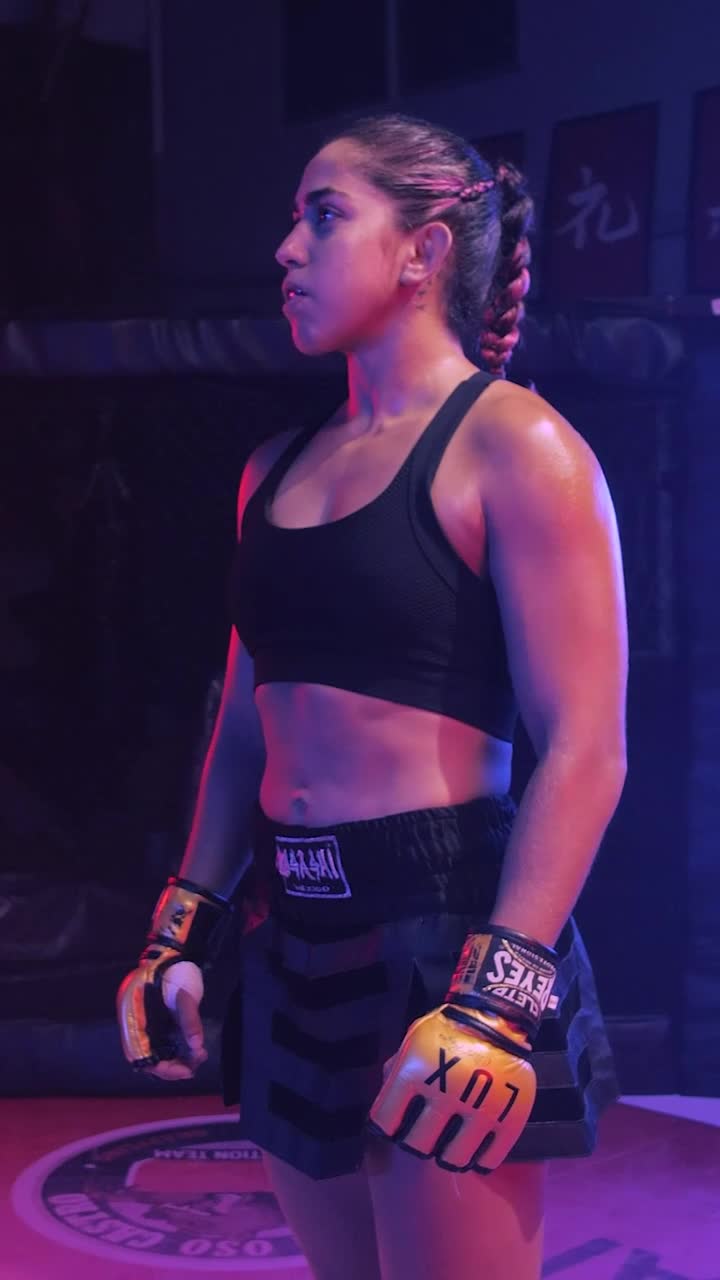 Free Video Stock Strong Female Fighter Standing On A Ring Live Wallpaper - Free Download
