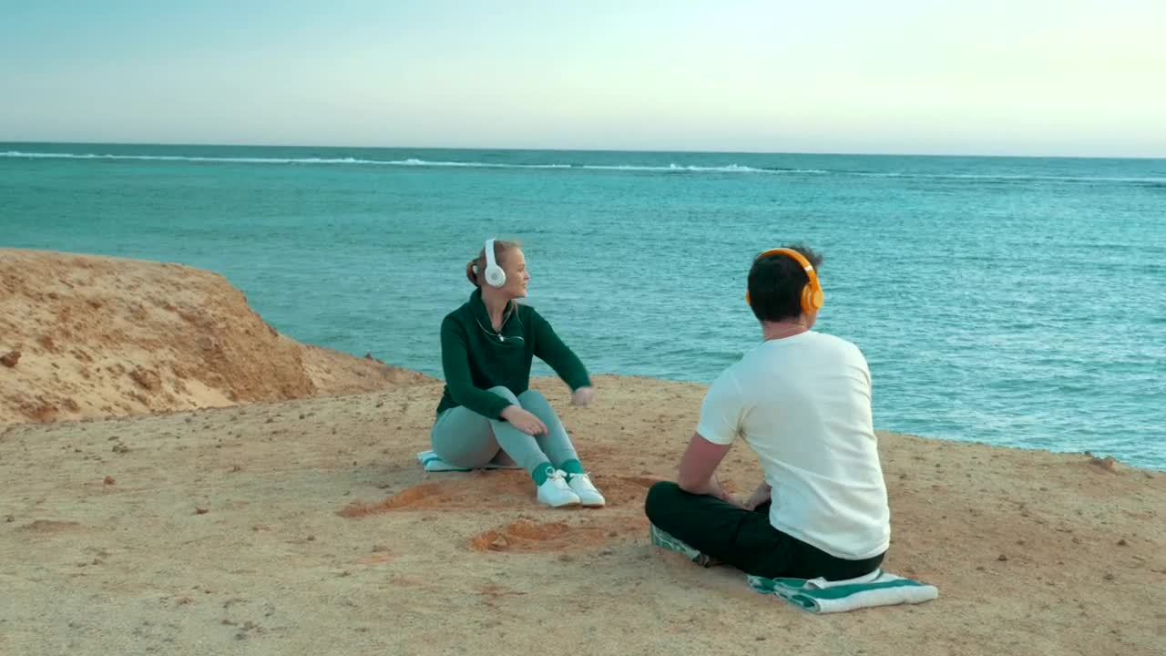 Stock Video Couple Listening To Music On A Cliff Live Wallpaper For PC - Free Download