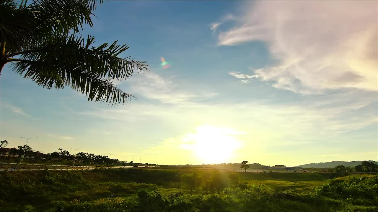 Free Video Stock sunset across vibrant farmland Live Wallpaper - Free Download