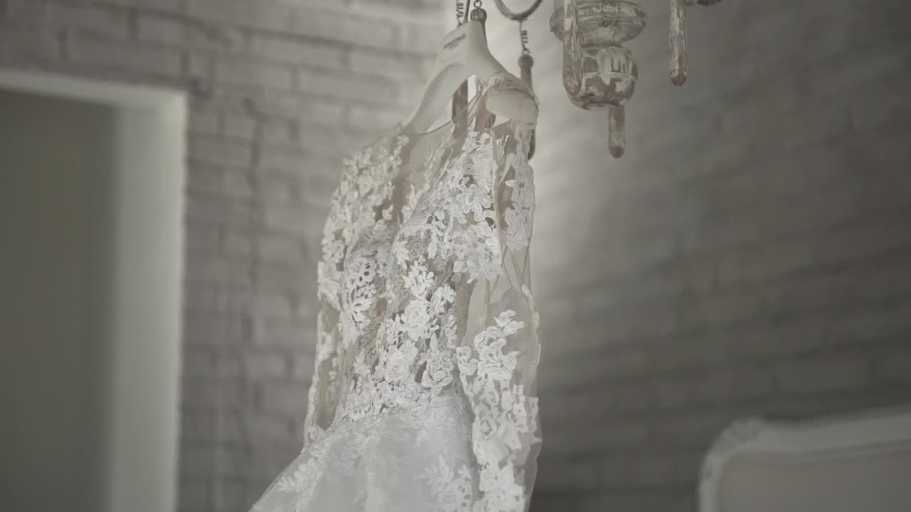 Stock Footage Wedding Dress Hanging On A Chandelier Live Wallpaper - Free Download
