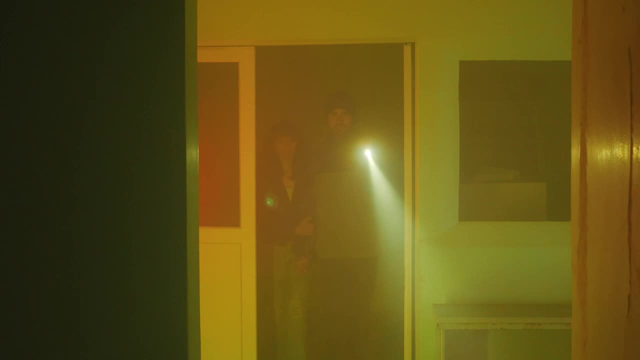 Stock Video Couple Exploring A Dark Old Place Live Wallpaper For PC - Free Download
