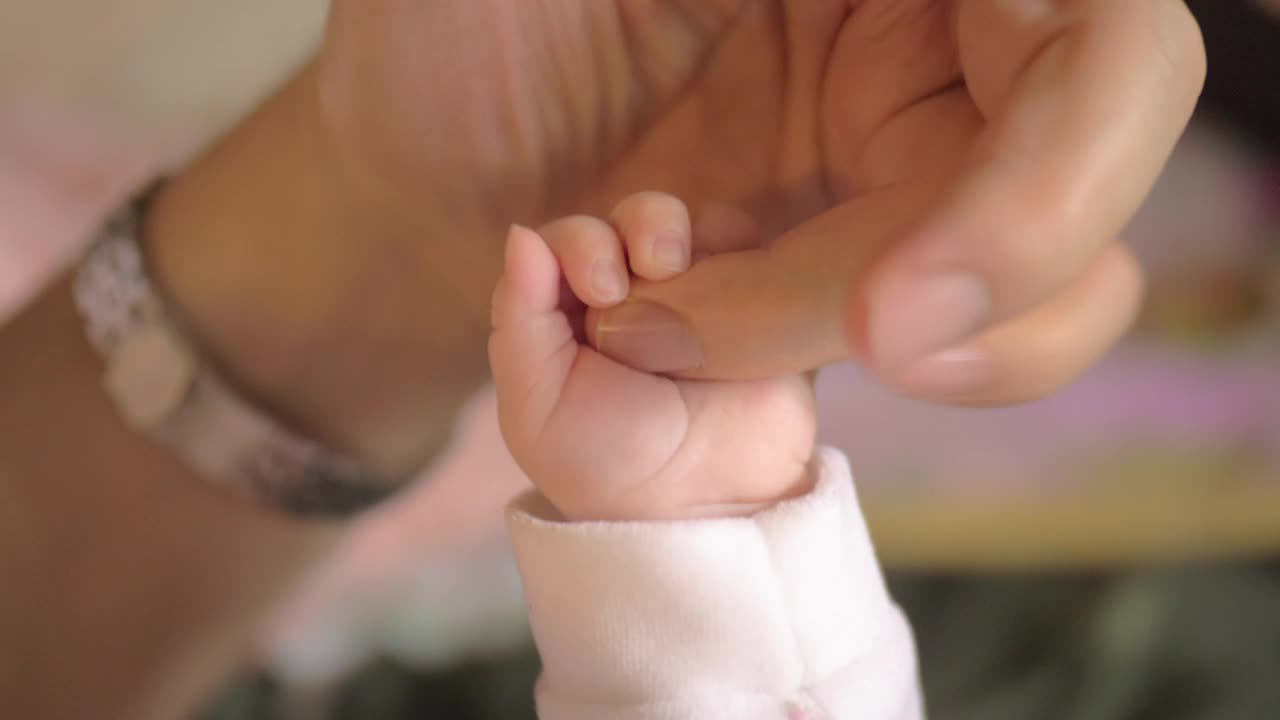 Stock Video Mother Holding Hands With Her Bab Animated Wallpaper - Free Download