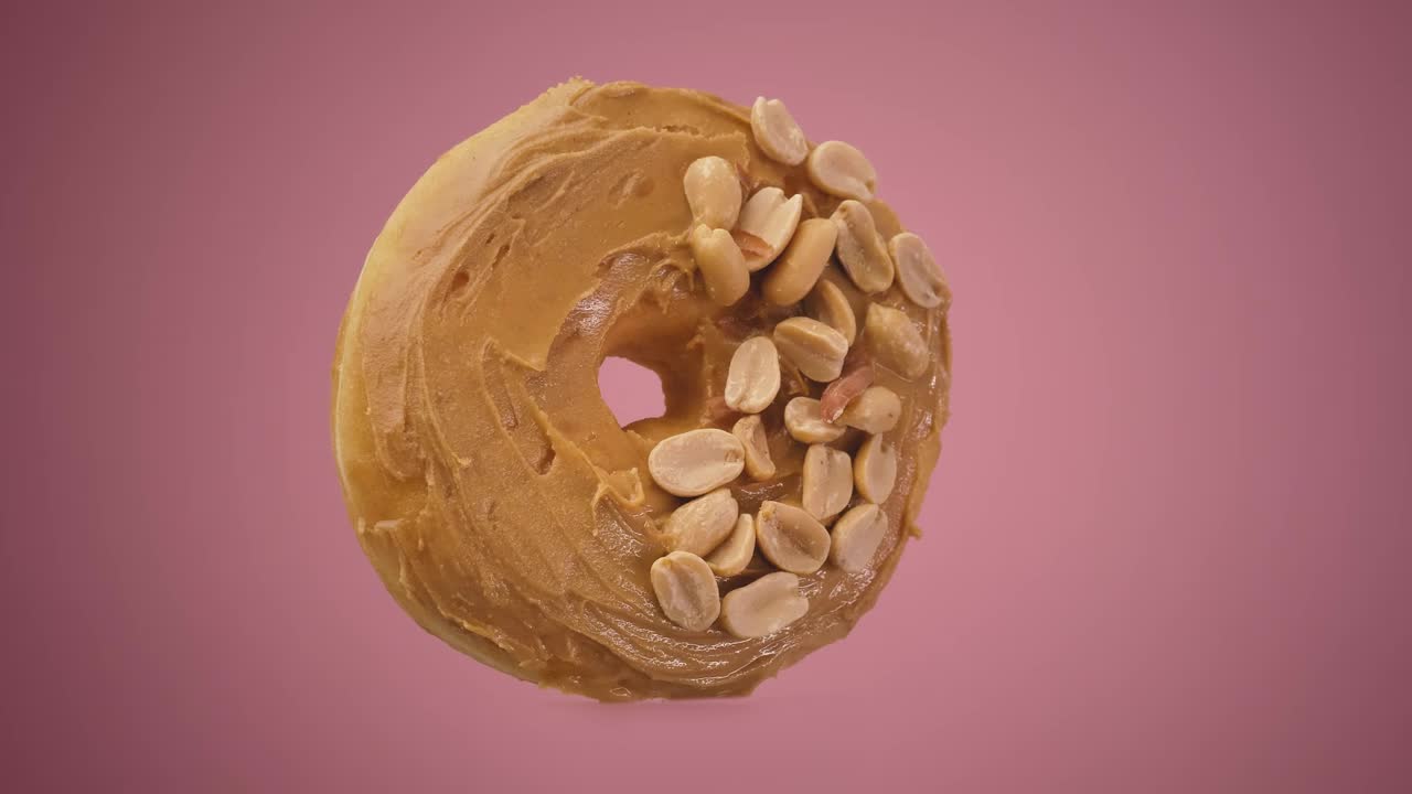 Free Stock Video Rotating Peanut Butter Donut On A Pink Background Live Wallpaper - Free Download