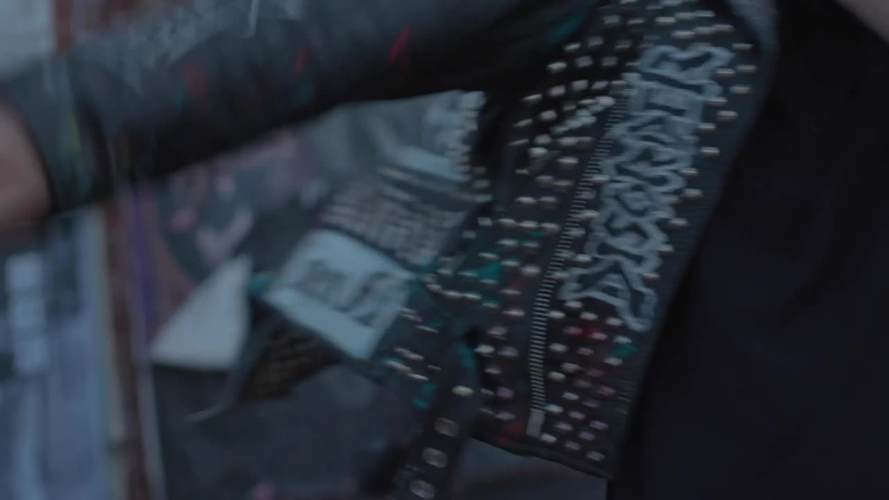 Video Stock Punk Man Puts On His Jacket Live Wallpaper Free - Free Download