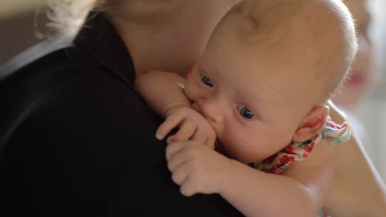 Stock Video Mother Holding Her Quiet Bab Animated Wallpaper - Free Download