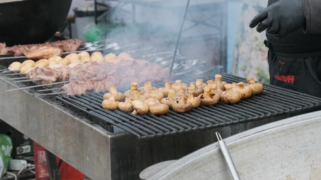 Stock Video Cook Preparing Meat And Mushrooms On The Grill Live Wallpaper For PC - Free Download
