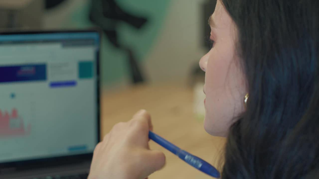 Free Video Stock thoughtful woman working in her office Live Wallpaper - Free Download