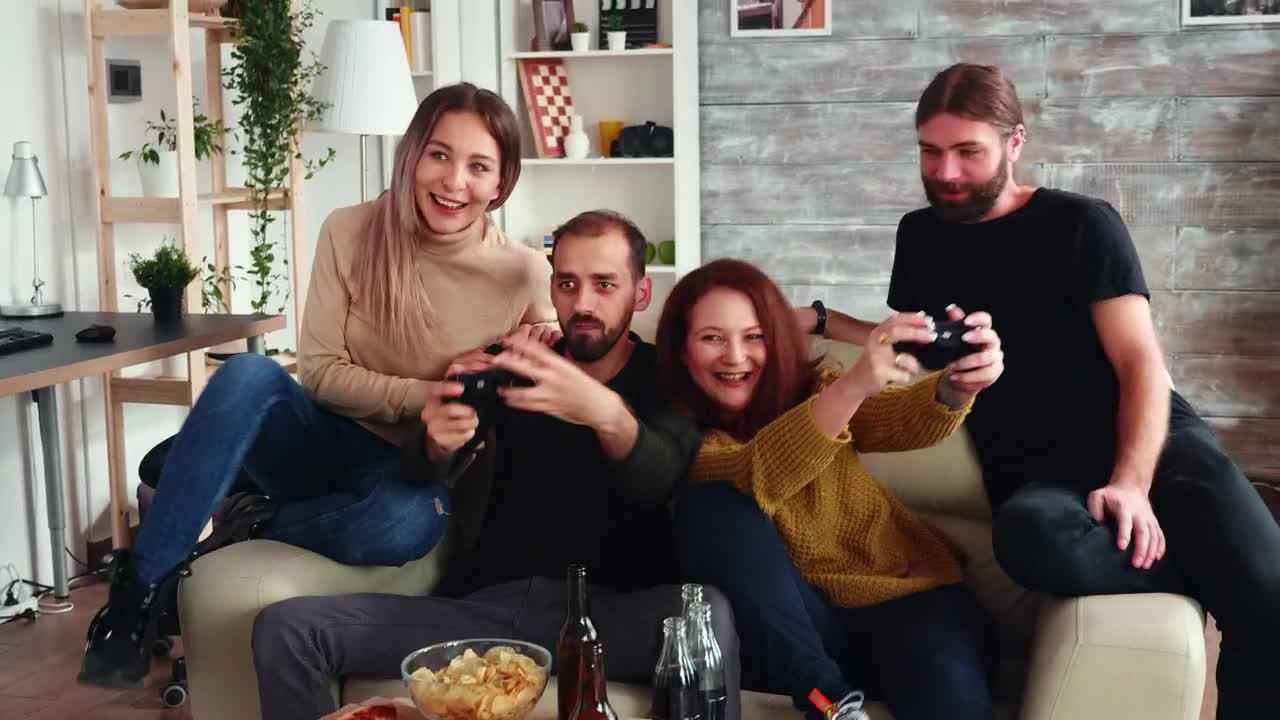 Stock Video Couple Enjoy Friendly Gaming Competition At Home Live Wallpaper For PC - Free Download