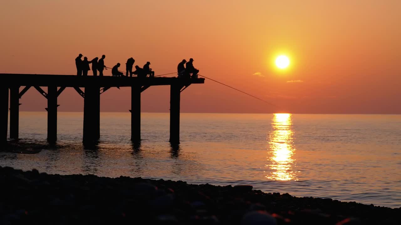 Free Stock Video Silhouettes A Fisherman Sitting At The Pier Live Wallpaper - Free Download
