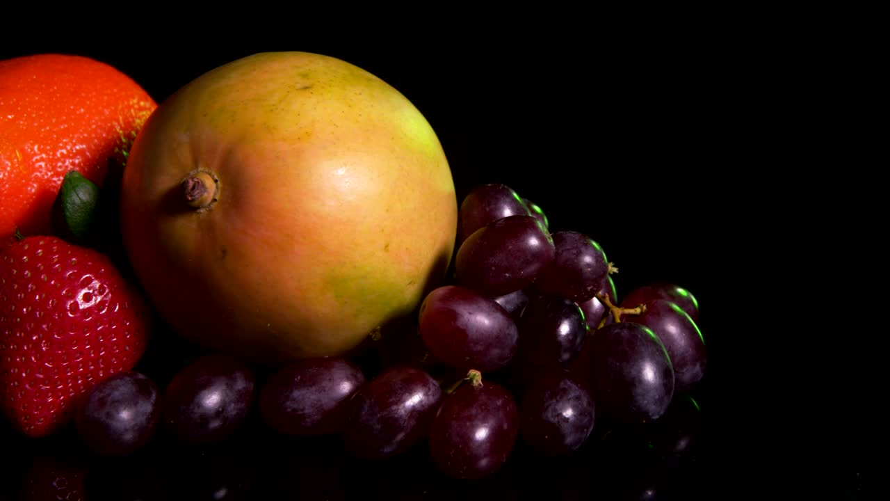 Stock Video Mixed Fruit On A Dark Tabl Animated Wallpaper - Free Download