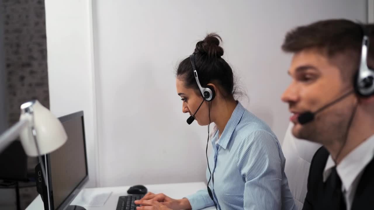 Stock Footage Woman And Man Working At A Call Center Live Wallpaper - Free Download