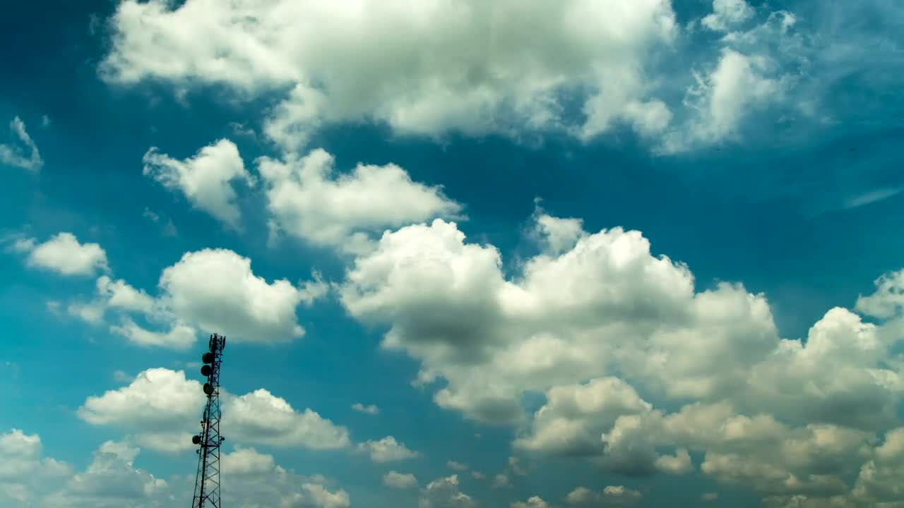 Stock Video Fluffy Clouds Over A Broadcast Tower Live Wallpaper For PC - Free Download