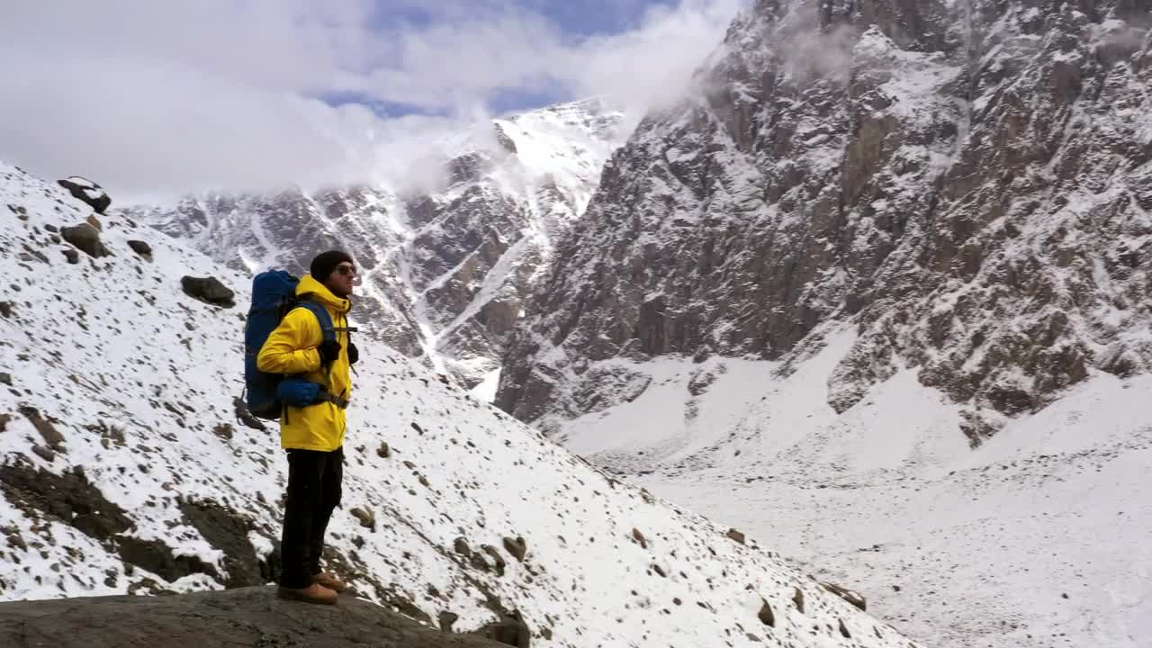 Stock Video Hiker Standing In Winter Mountains Epic Shot Animated Wallpaper - Free Download