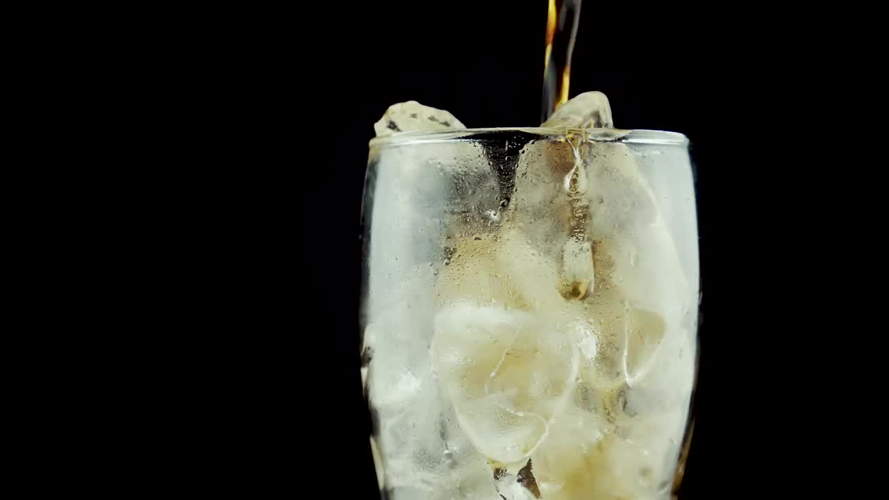 Stock Video Filling A Glass With Ice And Soda On A Dark Live Wallpaper For PC - Free Download