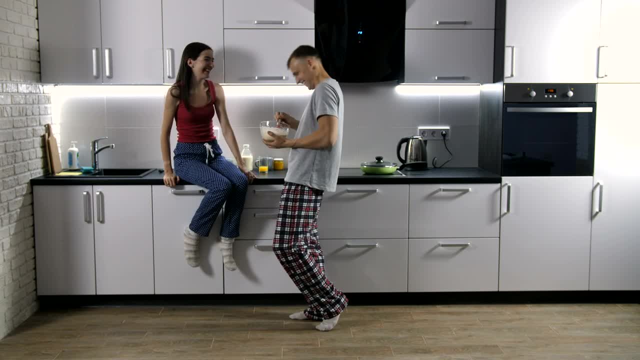 Stock Video Couple Listening To Music In The Kitchen Live Wallpaper For PC - Free Download