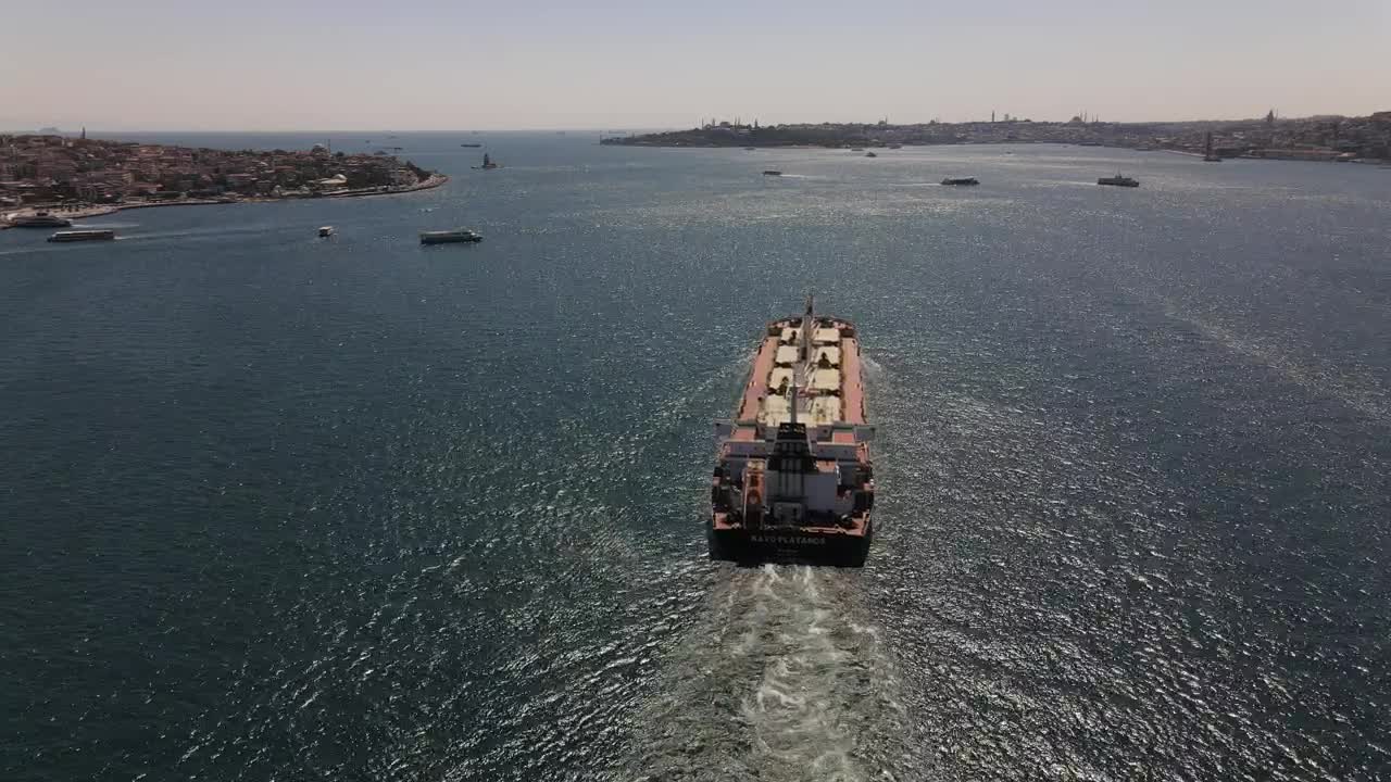 Free Video Stock tracking aerial shot of a cargo ship sailing Live Wallpaper - Free Download