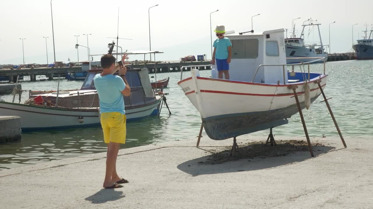 Stock Video Father And Son In A Small Harbor Live Wallpaper For PC - Free Download
