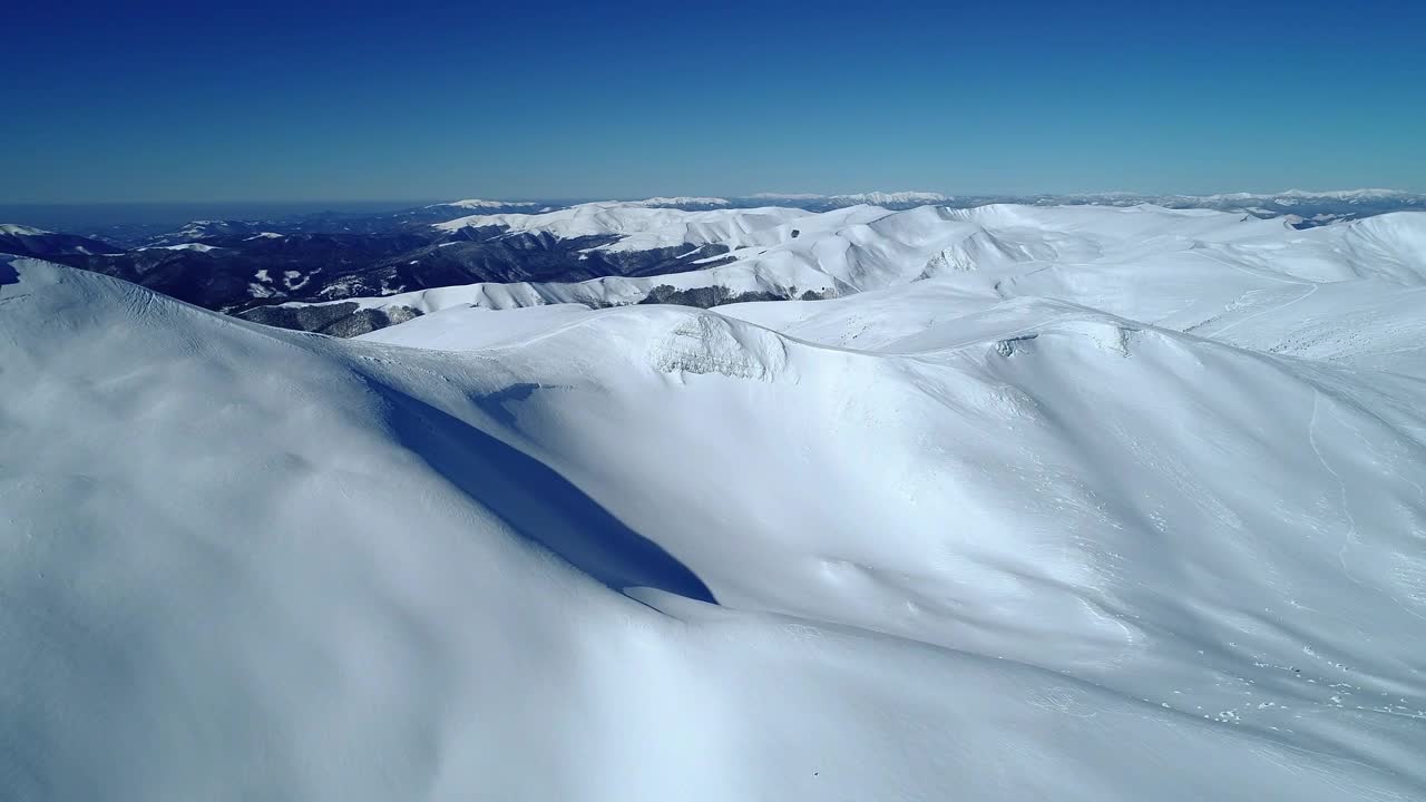 Free Video Stock Smooth Texture Of Snow Over Mountains Live Wallpaper - Free Download