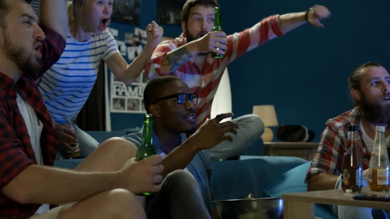 Stock Video Excited Friends Cheering At The Tv Live Wallpaper For PC - Free Download