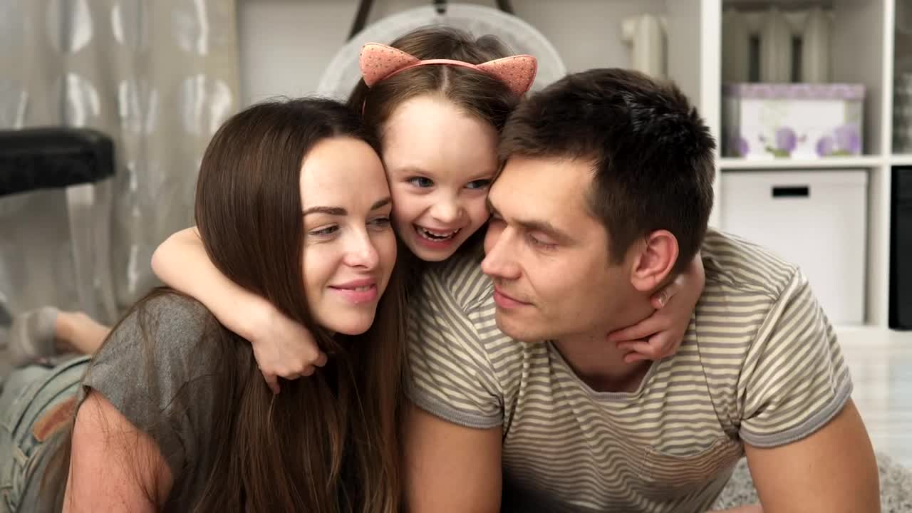 Stock Video Happy Family Smiling For The Camera Animated Wallpaper - Free Download