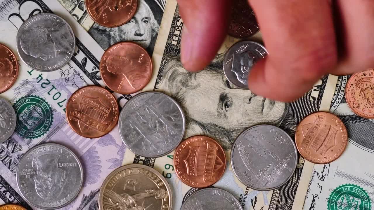 Free Stock Video Scene Covered In Bills And Coins As A Person Takes Live Wallpaper - Free Download