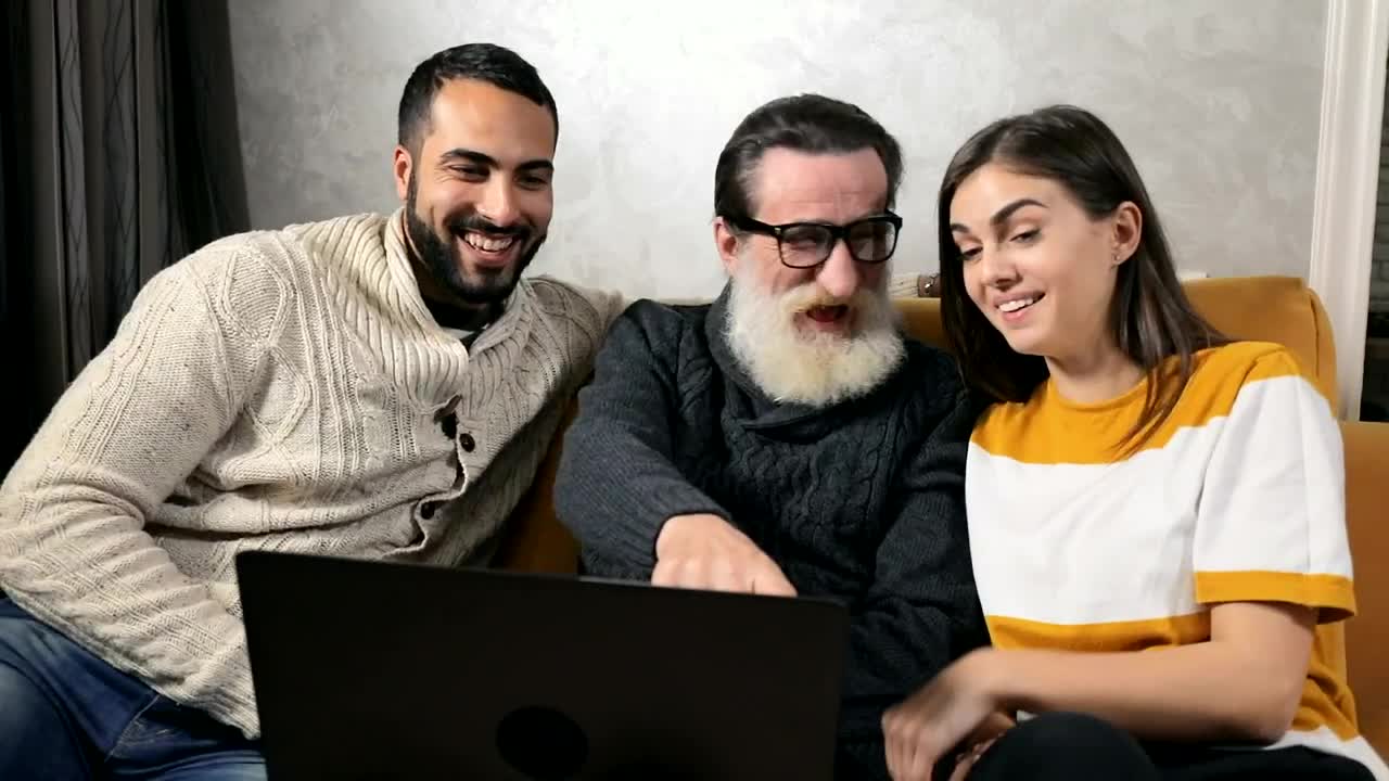 Stock Video Elderly Man Tells Grandchildren A Joke He Read On Web Live Wallpaper For PC - Free Download