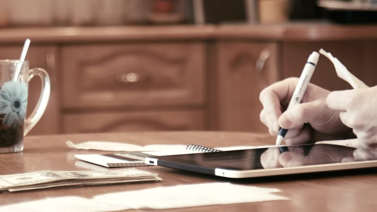 Stock Video Man Checking Bills And Doing Budgets Animated Wallpaper - Free Download