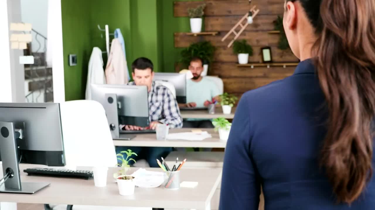 Free Video Stock team leader chats with man in creative office Live Wallpaper - Free Download
