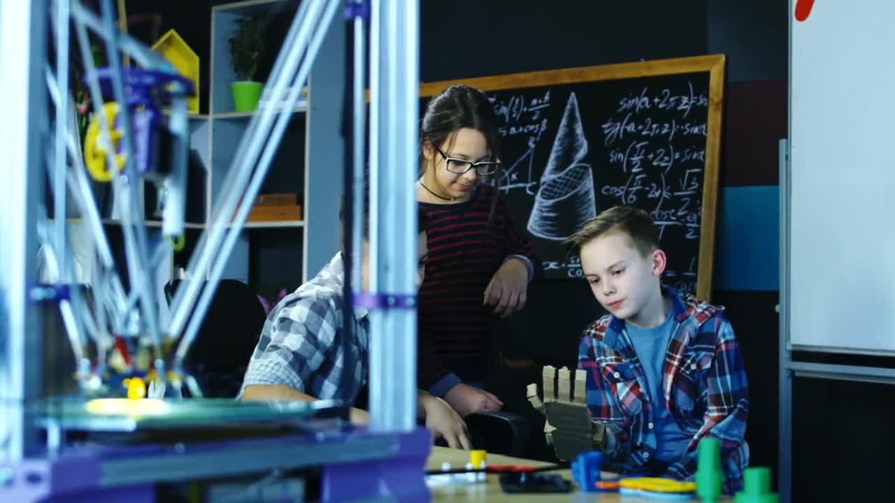 Stock Video Kids Try A Cardboard Robotic Arm Animated Wallpaper - Free Download
