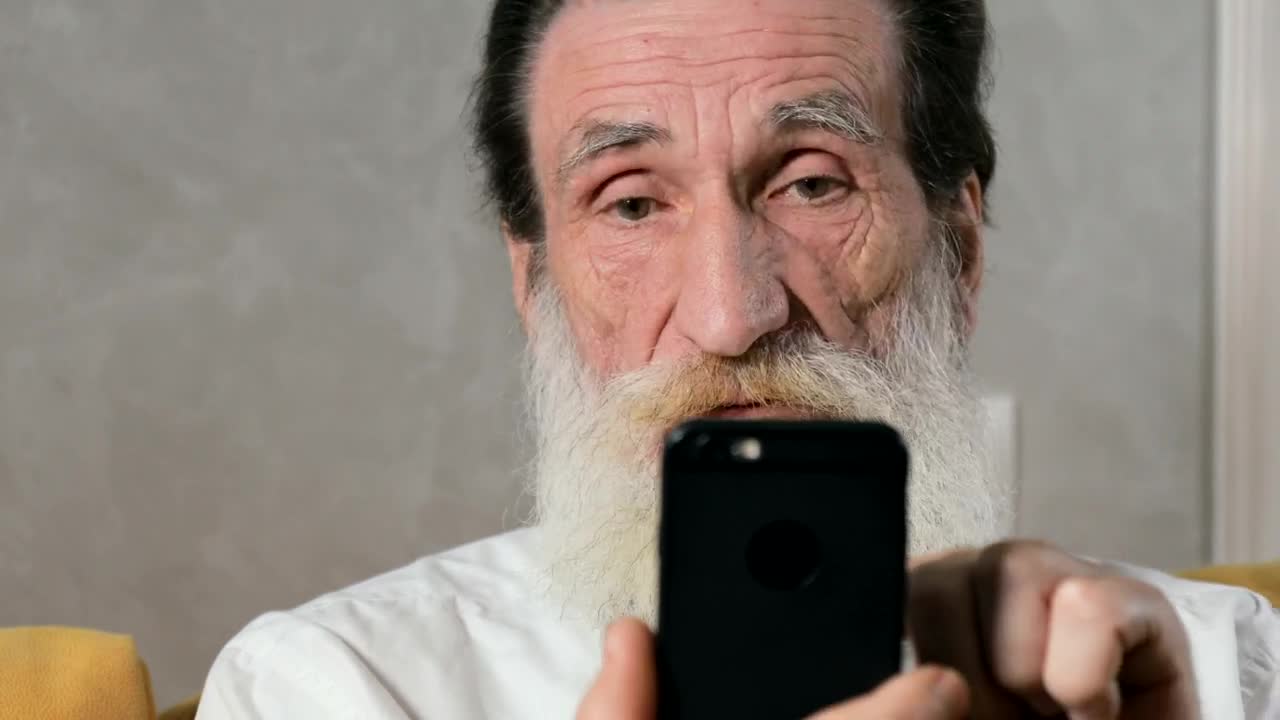 Stock Video Elderly Man Confused By Mobile App Live Wallpaper For PC - Free Download
