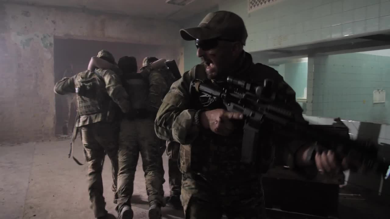 Free Video Stock Soldiers Carrying A Wounded Man Through A Building Live Wallpaper - Free Download
