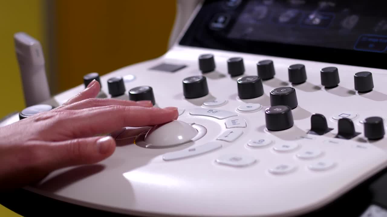Stock Video Doctor Preparing An Ultrasound Live Wallpaper For PC - Free Download
