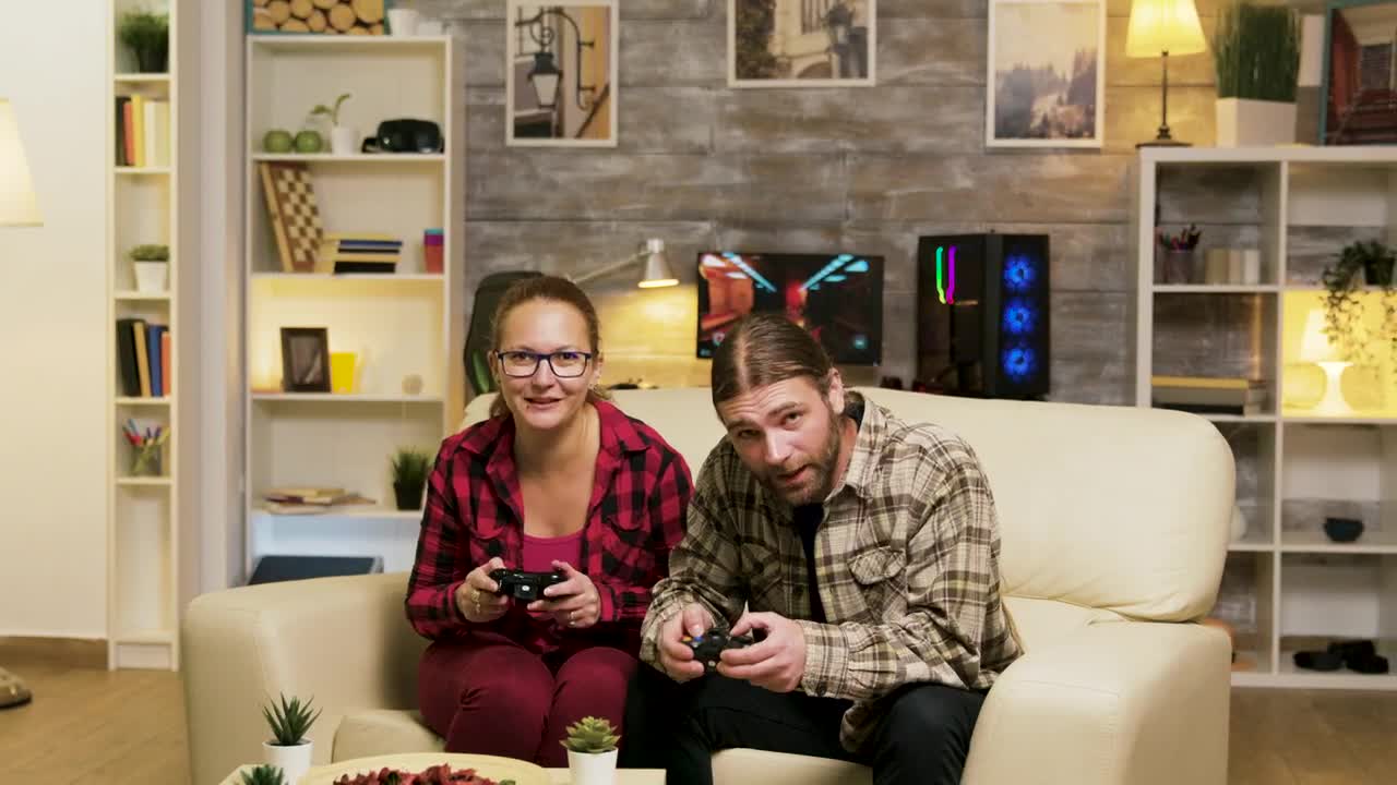 Stock Video Gaming Couple Jump Up To Celebrate Victory Live Wallpaper For PC - Free Download