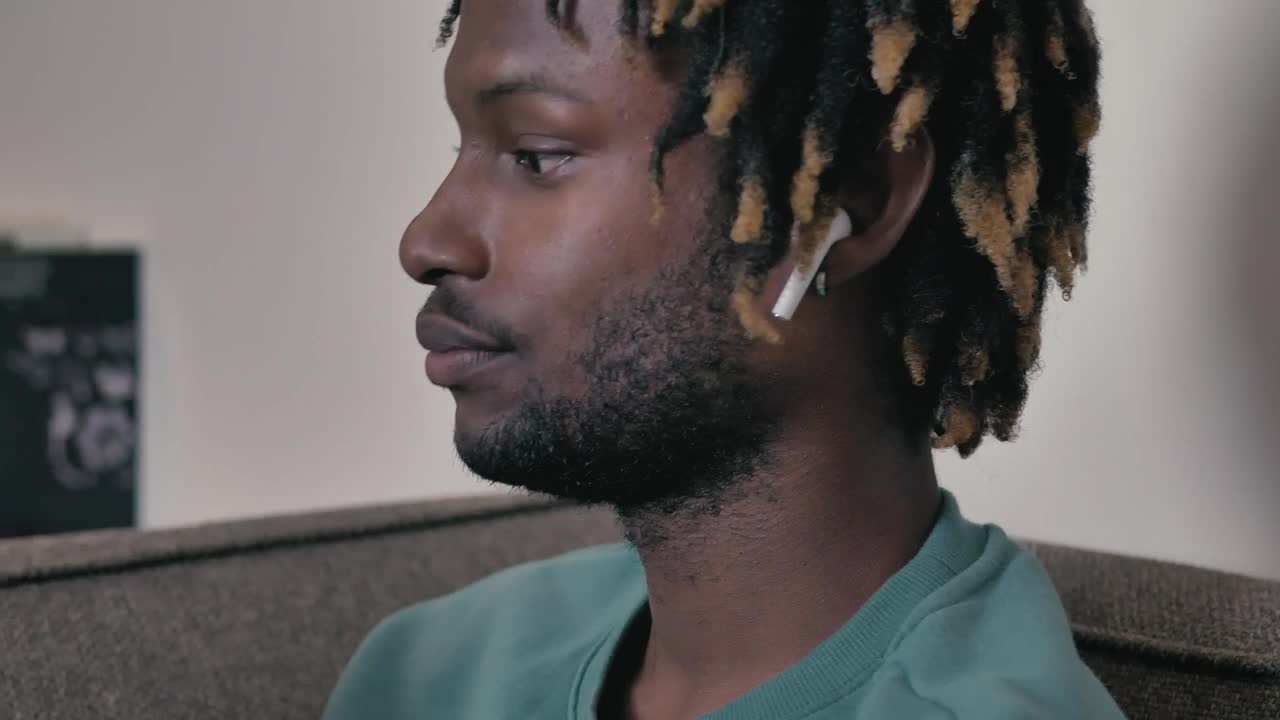 Stock Video Face Of A Man Listening To Music While Reading A Live Wallpaper For PC - Free Download