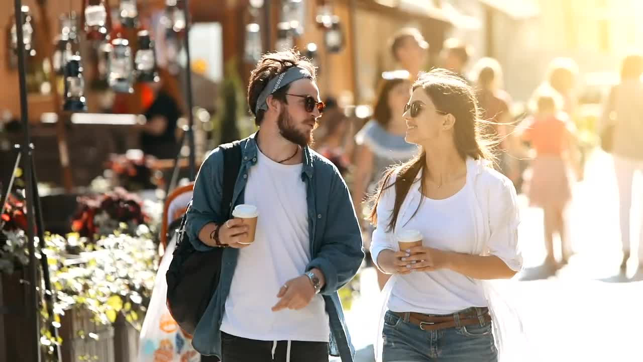 Stock Video Couple Stroll Down Sunny Street With Coffee Live Wallpaper For PC - Free Download