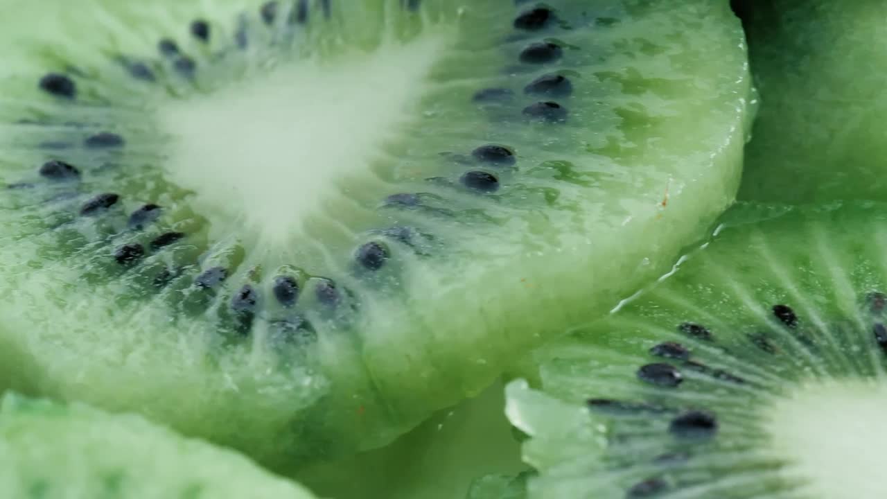 Stock Footage Wet Kiwi Slices In Detail Live Wallpaper - Free Download