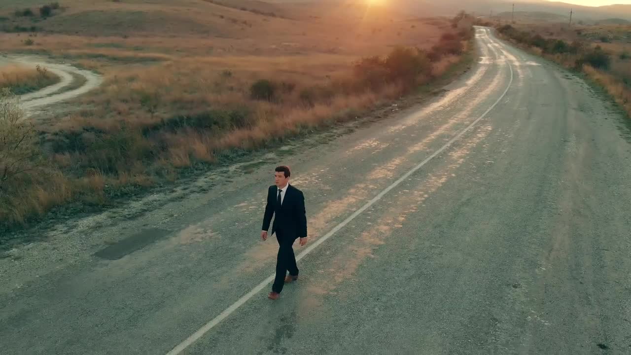 Stock Video Conceptual Video Of Businessman Walking On The Road Live Wallpaper For PC - Free Download