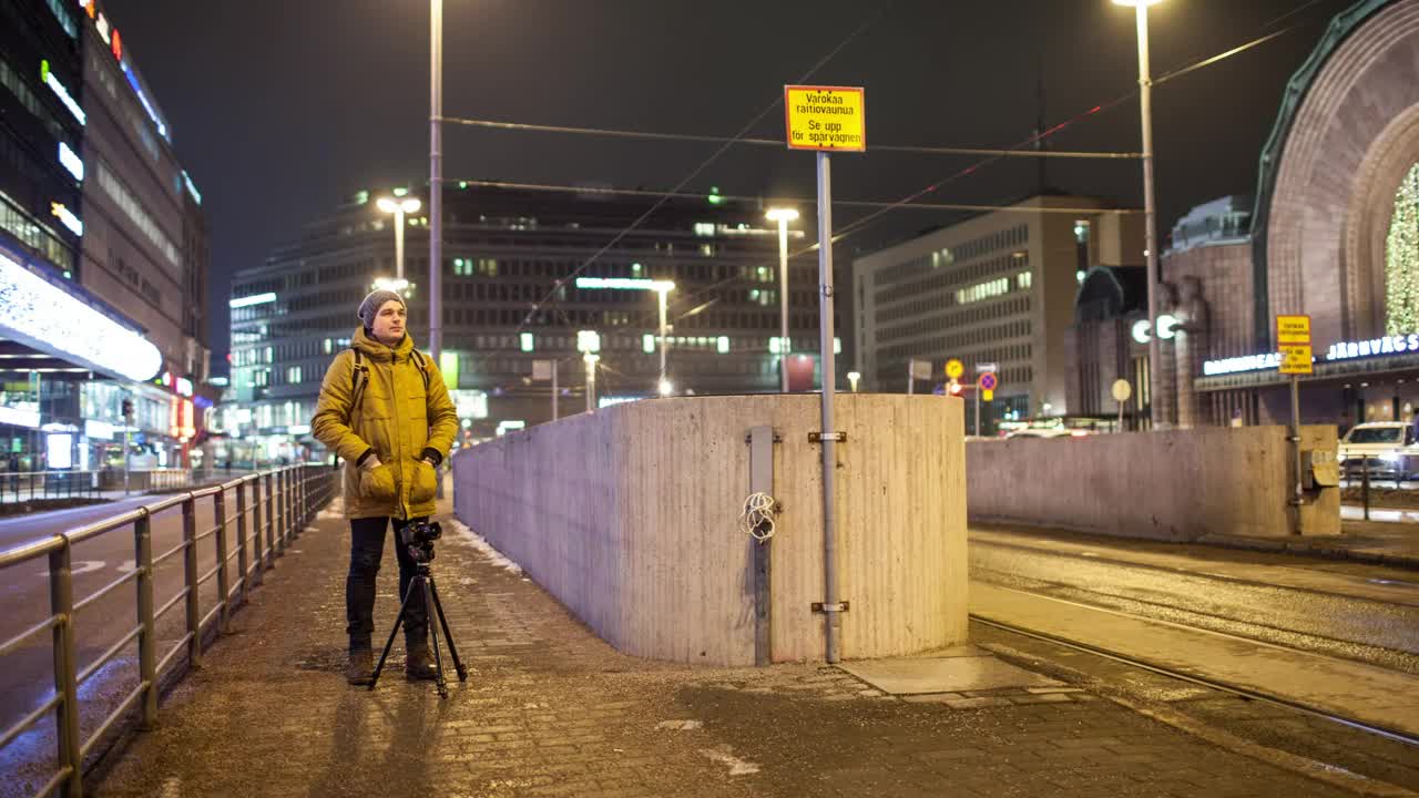 Video Stock Photographer Standing By A Tram Line Live Wallpaper Free - Free Download