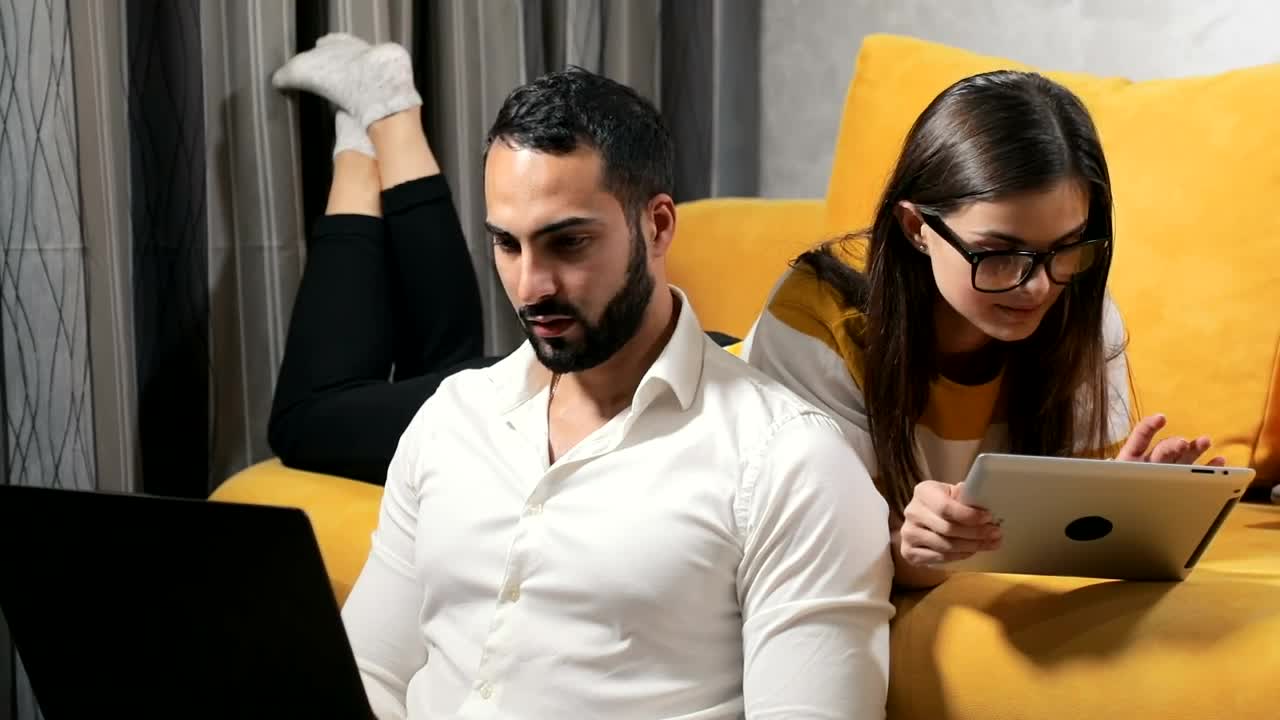 Stock Video Couple On Laptop And Tablet Work During Lockdown Live Wallpaper For PC - Free Download